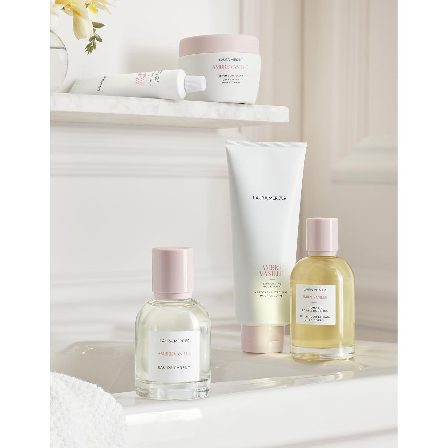 imageLaura Mercier Exfoliating Body Wash Strawberry Seed and Sugar ScrubInfused Exfoliator Removes Impurities Helps to Improve Uneven Skin Tone Elasticity and CirculationAmbre Vanille