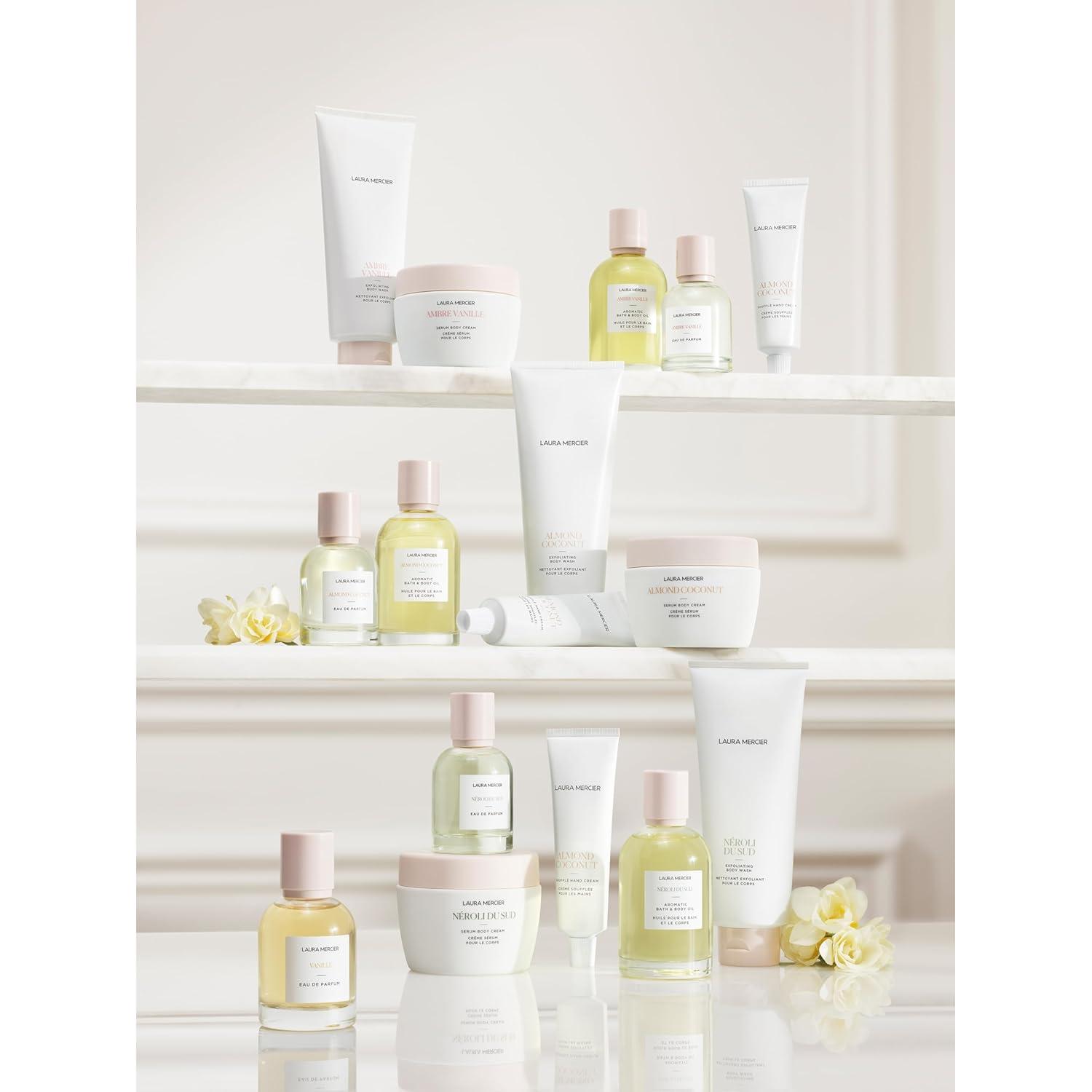 imageLaura Mercier Exfoliating Body Wash Strawberry Seed and Sugar ScrubInfused Exfoliator Removes Impurities Helps to Improve Uneven Skin Tone Elasticity and CirculationAlmond Coconut